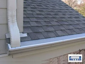 GutterDome guard fitted as a custom insert to a first-story gutter.