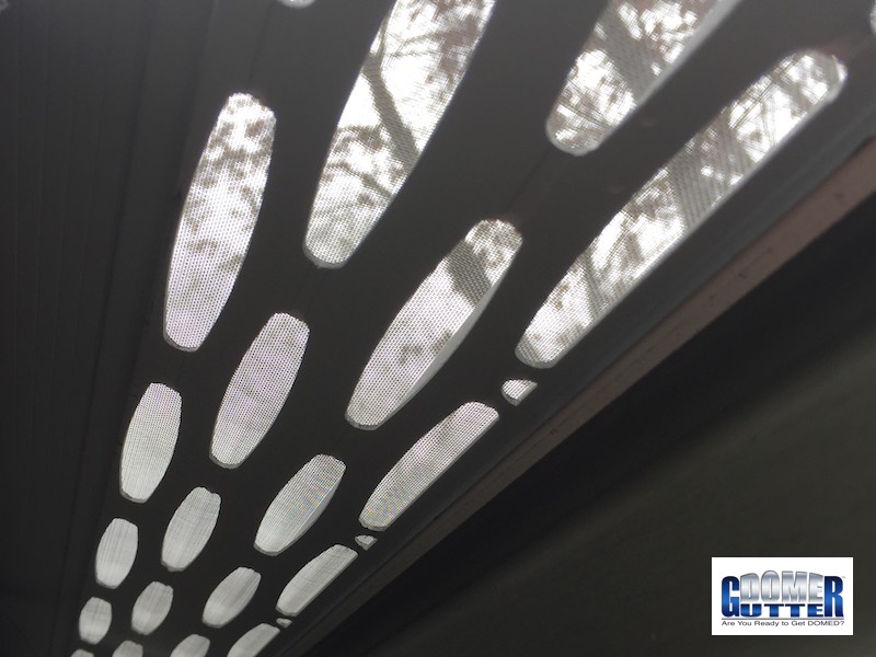 Inside view of a GutterDome GD45 gutter guard showing a clean, clear gutter channel.